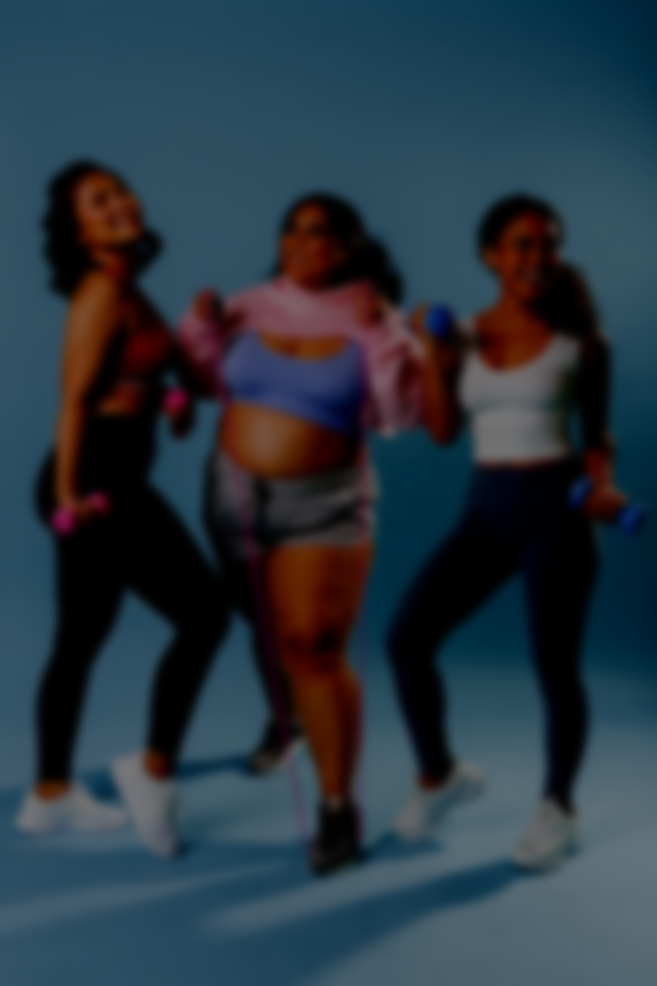 Women in Activewear Exercising on Blue Background