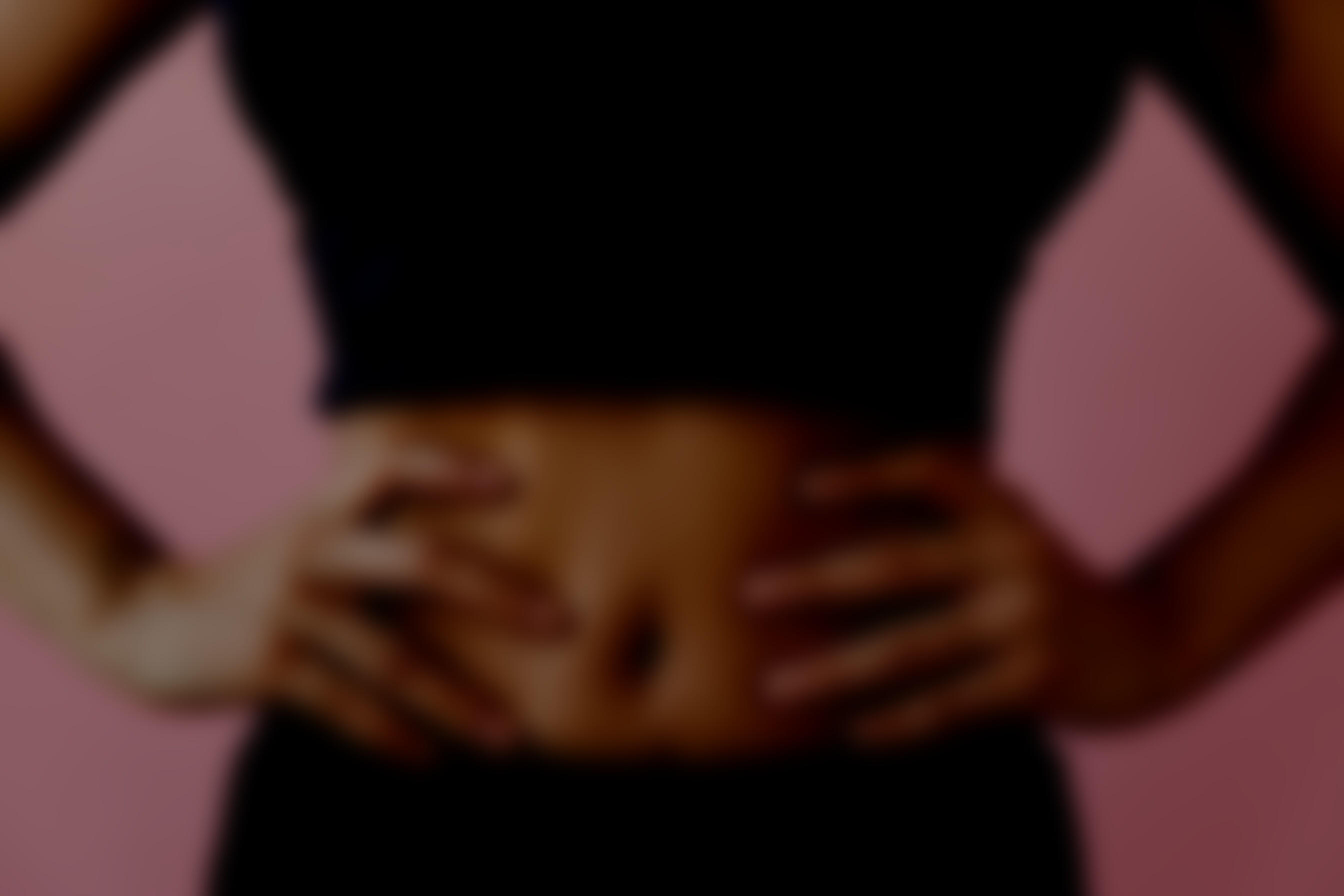 A Woman Hands on Her Belly